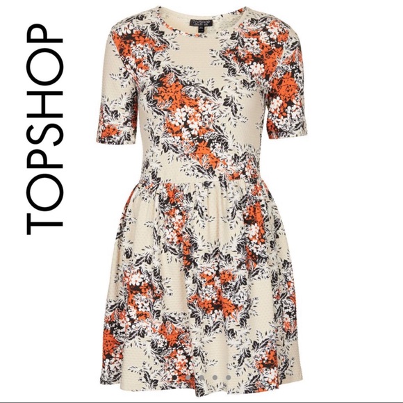 Topshop Dresses & Skirts - TOPSHOP
Women's Orange Floral Texture Flippy Dress